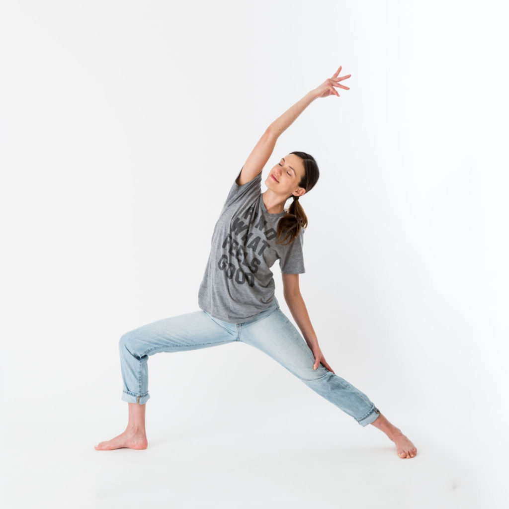 Adriene in high lunge